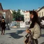 Placeholder: A picture of the city of Lutenblag, Molvania, East Europe 1990's, paradoxical, phia seti, brutta, vestita male, parody
