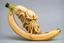 Placeholder: A high-resolution photograph of intricate scrimshaw of the face of Cthulhu carved into a banana, surreal, profound,