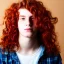 Placeholder: teen, male, with long red curly hair, real photo, soft lighting