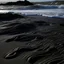 Placeholder: black sand waves