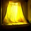 Placeholder: An ethereal dreamscape filled with dark golden mist, soft dark yellow light floating through translucent curtains, a peaceful intimate space, abstract shapes of a bed and window barely visible, surreal atmosphere, inspired by quiet romantic dreams, floating fabric, silence and warmth, painterly style, oriental