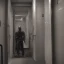 Placeholder: joe rogan lost in a hallway of toilets