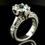 Placeholder: wide white gold, three stone diamond engagement ring, cathedral raised shoulders