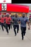 Placeholder: 200 black men running into a KFC chicken restaurant doing everything to get chicken pure chaos. birdseye vieew. make it more black men. WAy more they are raiding it. and make them look dangerous