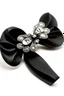 Placeholder: Black tie Contains silver brooch