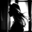 Placeholder: Blurred image, silhouette of woman moving hair, black and white, white light