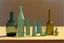 Placeholder: A still life with glass bottles and a glass vase in sand dunes by Giorgio Morandi