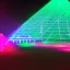 Placeholder: lasers illuminate pyramid