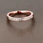 Placeholder: delicate thin ring with diamond dust, knot, rose gold, thin ring