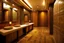 Placeholder: Pictures of a group of bathrooms in Mathaf Restaurant. The walls and floors are colored in brown tones