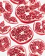 Placeholder: pomegranate slices are scattered on a white background