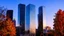 Placeholder: Downtown with glass towers, autumn, evening