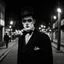 Placeholder: very grainy discolored modern photo, closeup portrait, dark night street with no lights, grunge, male with chalk-white skin wearing a 1910's costume, elegant, knowlegeable