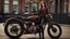 Placeholder: full-height portrait of a woman with straight shoulder-length auburn hair, with metal arms and legs, dressed in leather trousers, and a waistcoat, in a Victorian street next to a steampunk motorbike blue sky