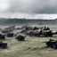 Placeholder: There goes the siren that warns of the air raid Then comes the sound of the guns sending flak Out for the scramble, we've got to get airborne Got to get up for the coming attack