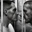 Placeholder: realistic, two italian prisoners 44 years old kissing in prison behind bars, dirty, ugly, bullneck, muscular tubby, in tank top, long hairs, manly chest, misery and poverty, emotive eyes, photo 50mm lens, side view, photorealistic, ultradetailed