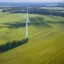 Placeholder: Aerial Drone Footage of Wind Turbines in Rural Area with Green Forests and Fields