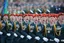 Placeholder: Soldiers marching in formation; military parade; passionately shouting;