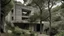 Placeholder: Among centuries-old trees, a house with a brutalist design merges seamlessly into the landscape, embodying the raw beauty of the primitive. The structure, weathered yet strong, is captured in a striking photograph that exudes a sense of timelessness. Every detail, from the stark angles to the rough texture of the concrete, adds to the haunting allure of the scene. This captivating image invites viewers to ponder the enduring power of nature and architecture.