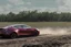 Placeholder: A Tesla 'Model S' is racing at top speed, at the Wetlands of Louisiana. (CINEMATIC, WIDE ANGLE LENS, PHOTO REAL)