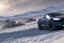 Placeholder: A Tesla 'Model S' is racing at top speed, on the planet 'Hoth'. CINEMATIC. WIDE ANGLE LENS. PHOTO REAL.