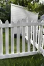 Placeholder: white fence in yard, photograph