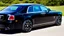 Placeholder: ultimate black rolls royce with Fire Livery, Rear View, 4K, Ultra Detailed