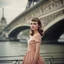 Placeholder: young beautiful woman, hairstyle in the style of the 60s, looking to the side, dressed in the fashion of the 60s, full length, against the backdrop of the embankment in Paris, Polaroid film, natural colors, photo