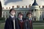 Placeholder: realistic young Harry Potter movie characters in front of white house