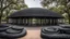 Placeholder: Pavilion made from hundreds of old used tyres, amazing detail, beautiful composition, award-winning photograph, astonishing realism, 28mm lens, adjust perspective