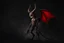 Placeholder: a sinister grinning devil standing facing right