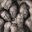 Placeholder: close up 35mm lens, top view of three gipsy prisoners 45 years old sleeping laying down inside a dirty jail, ugly, bullneck, strong beefy, in tank top, manly chest, tattoo, misery and poverty, photorealistic, ultradetailed, 32keyes