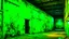 Placeholder: A neon green warehouse covered in mold painted by Vincent van Gogh