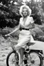 Placeholder: [Marilyn Monroe, bicycle] Mesmerized By The Sights Of Earth In The 1970s This Little Barbie Misses His Ride Home