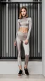 Placeholder: satin leggins, lycra leggins, satin top, lycra top, short wavy bob haircut, teenage girl, thinner, thin body, androgyn