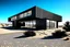 Placeholder: modern architecture black house in the desert with detailed sand