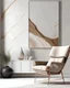 Placeholder: Beige lounge chair against marble wall with abstract poster. Minimalist home interior design of modern living room.