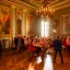 Placeholder: Celebration in a schloss, austrian people, ledherhosen, Austrian aesthetic, warm colors, wooden floor, forest green walls, night time, 8k, HD, cinematography, photorealistic, Cinematic, Color Grading, Ultra-Wide Angle, Depth of Field, hyper-detailed, beautifully color-coded, insane details, intricate details, beautifully color graded, Cinematic, Color Grading, Editorial Photography, Depth of Field, DOF, White Balance, 32k, Super-Resolution, Megapixel, ProPhoto RGB, VR