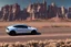 Placeholder: A Tesla 'Model Y' is going at a high speed, near the 'Devils Tower' in Wyoming. (CINEMATIC, WIDE ANGLE LENS, PHOTO REAL)