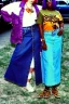 Placeholder: year 1996 denim fashion. Loose skirt, low waist. Colors: denim blue, blue, purple, cream, khaki, light green, lilac, plum, orange, terracotta, red, light yellow, pink, dark blue, beige. Latex in small part. Cheetah pattern. Gwen Stephani, Missy Elliot, Shirley Manson.Cargo pants