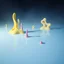 Placeholder: Fotografia di una superficie piatta di colore azzurro chiaro e giallo pastello, su cui si ergono surreali strutture di forma astratta, di plastica dura, di colori pastello, che scende a terra. Yves Tanguy. Nebbia, oscurità, paranoic, obsessive, nightmare, notte, glossy, surreal, hasselblad h6d400c --ar 85:128 --v 6.