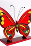 Placeholder: A red butterfly designed in Maori sculptures painted by Wassily Kandinsky