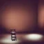 Placeholder: a single chair on stage under spotlight in front of empty hall