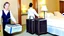 Placeholder: suspicious hotel housekeeping stealing someone's baggage