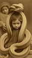 Placeholder: An old picture style of brown and white mono tone picture very bad quality looks very old camera picture of a girl surrounded snake with big head around her the year 1900