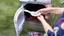 Placeholder: woman puts spoons in her dryer