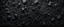 Placeholder: Black abstract background. Dark rock texture. Black stone background with copy space for design. Web banner. Wide. Panoramic.