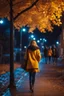 Placeholder: night yellow lights over the street trees autumn leaves under feet ,a Student adult girl with books in her hand walking in street looking to camera a boy who loves her flowing her from distance back