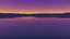 Placeholder: sunset over the light rippling waters of the bay