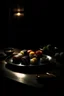 Placeholder: plate of variety of sushi on a table in dark dimmed room in japan style